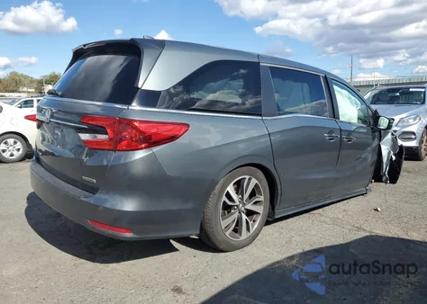 2021 Honda Odyssey Touring from USA, damaged, VIN 5FNRL6H82MB006451